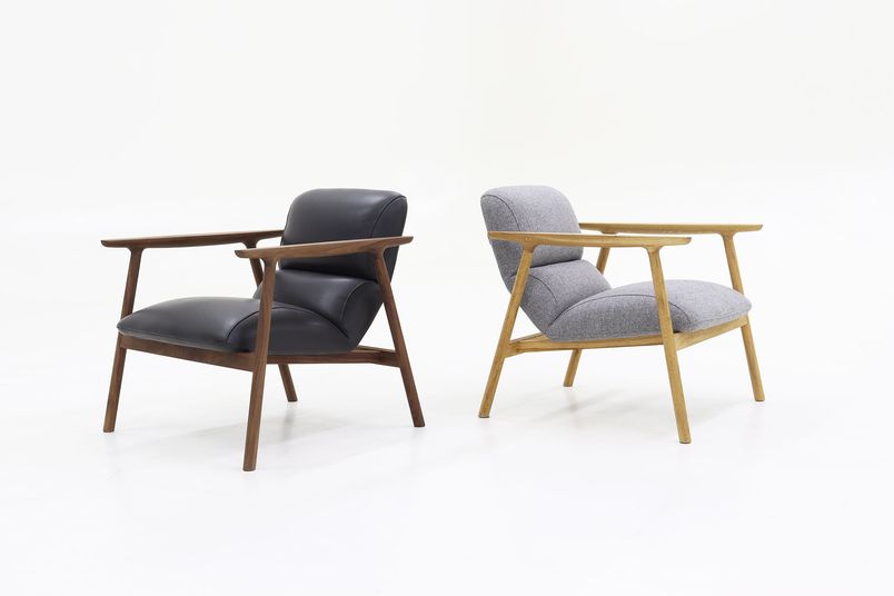 Dika lounge chair can be finished in fabric or leather upholstery.