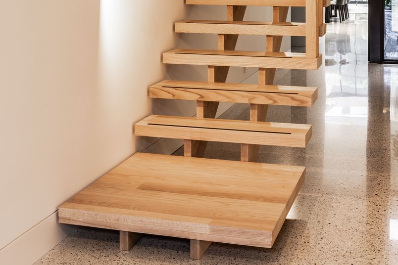 Astrid by Studio Seven Designs featuring a Glacial Oak staircase.