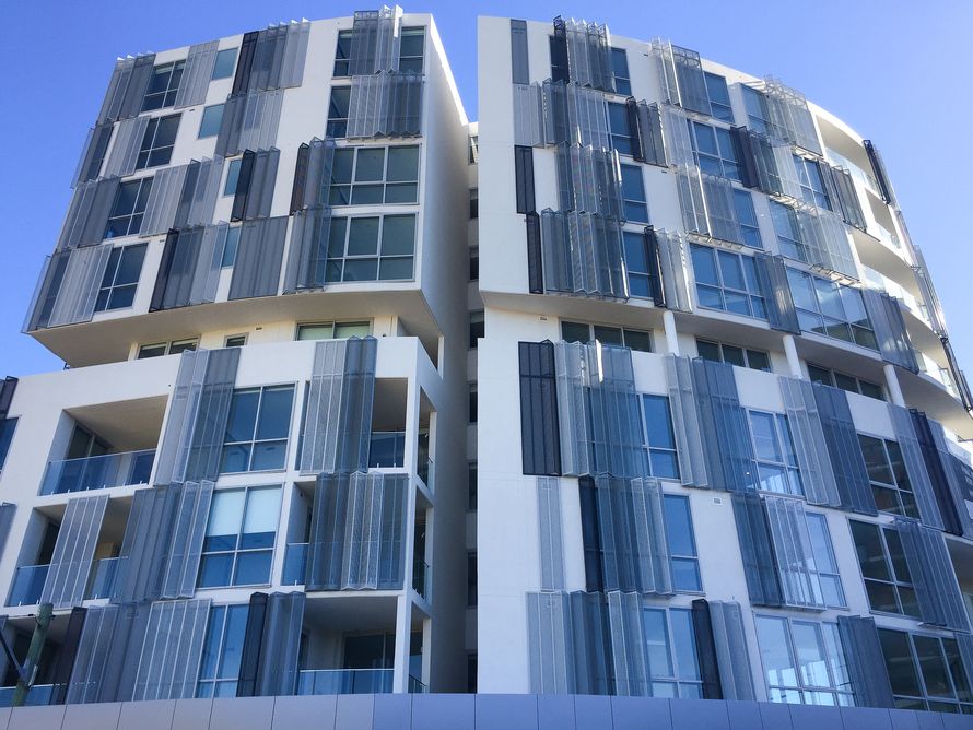Arrow Metal's shutter facades at Infinity apartments