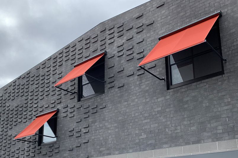 Warema's range of drop arm awnings offer superior wind resistance.