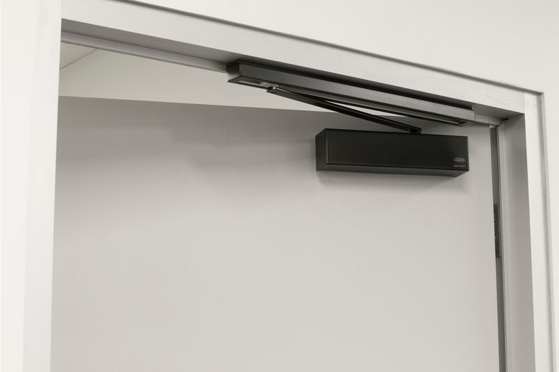 Surface-mounted black door closers from Lockwood have high-quality, efficiency and reliable performance.